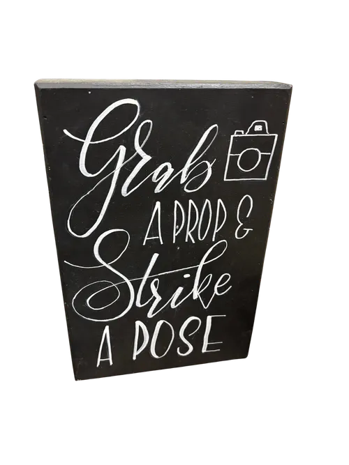 Grab a Prop Strike a Pose Sign