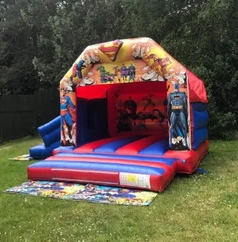 Super Hero Bouncy Castle and Slide