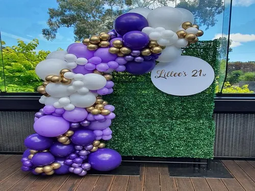 Small Green Wall with Balloon Garland & Hanging crylic Round Sign