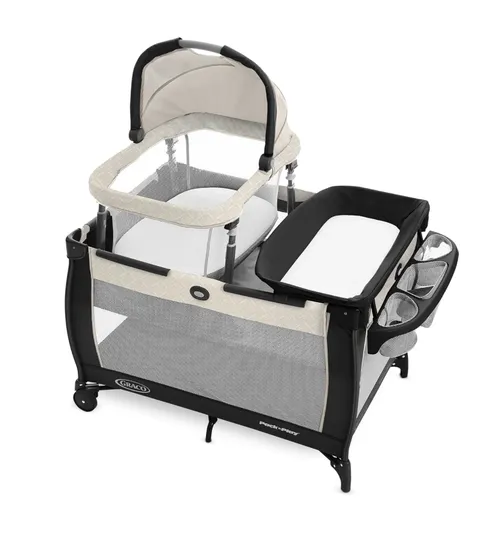 Pack N' Play - mini bassinet and changing table