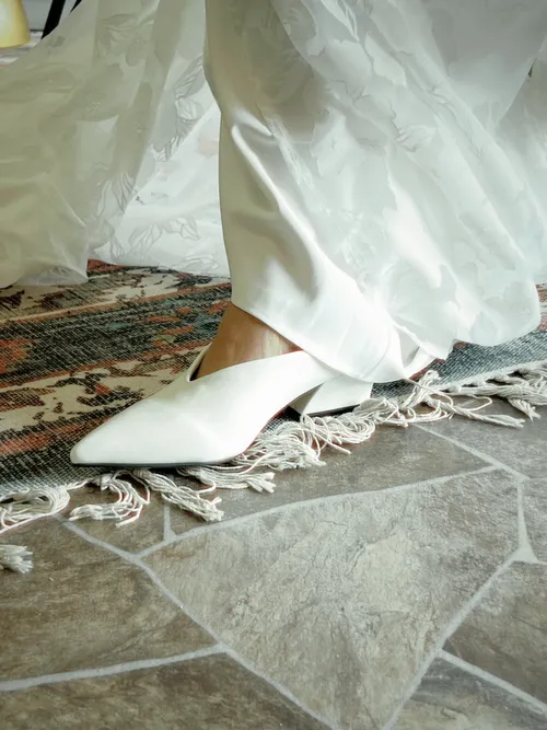 Pointed toe mule heel