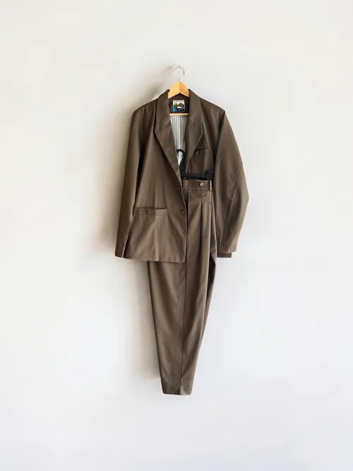 Setup with tucked pants