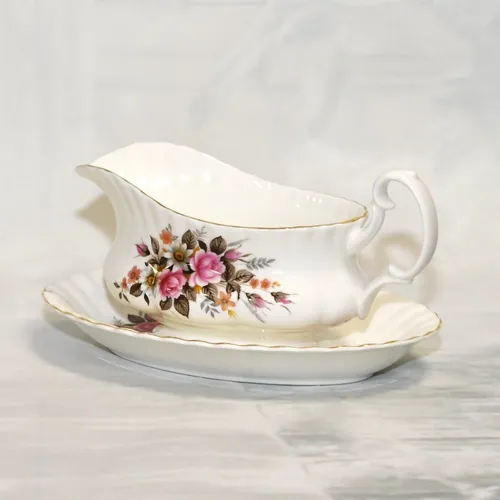 Vintage gravy boat and stand