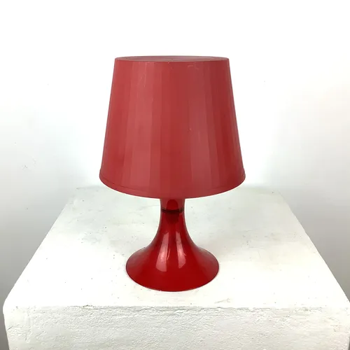 Red plastic IKEA lamp
