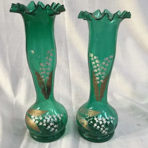Pair of green glass vases with scalloped edge and hand painted floral decoration