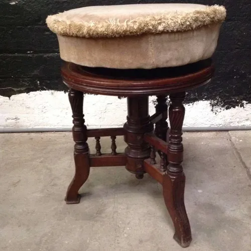 wood swivel stool with cream cushion