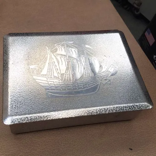 metal box with ship design