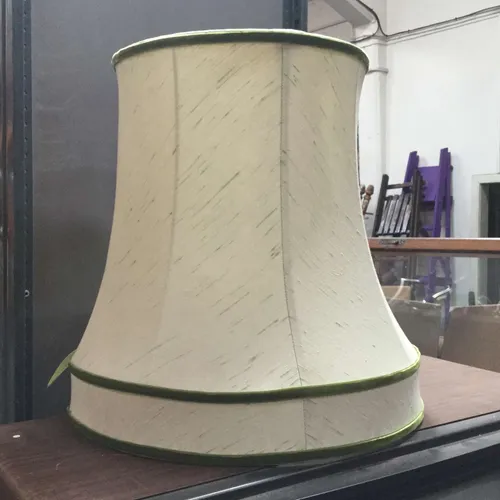 Cream lampshade with green edge detail