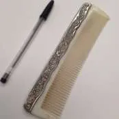 comb with silver decoration