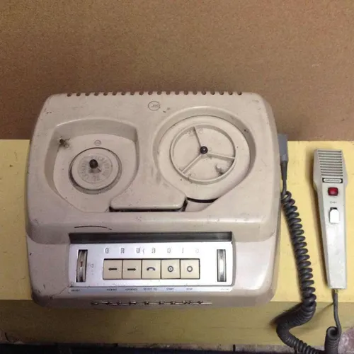 Period Grundig Stenorette with microphone attachment in beige and silver