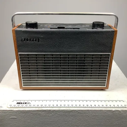 Hacker Autocrat transistor radio unit with black vinyl and wooden veneer