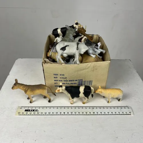 Box of Plastic Toy Animals