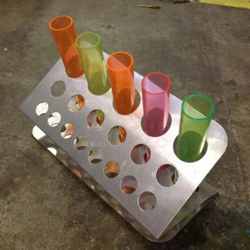 metal test tube holder with plastic test tubes
