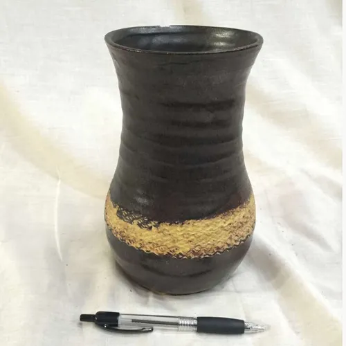 Small black ceramic vase with yellow gold ring detail