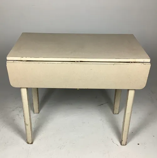 White wood Formica drop leaf table with individual drawer