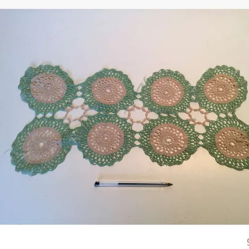 pale green and beige crochet 8 circled table mat