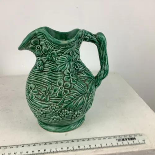 Teal Jug with scalloped edge and floral decoration