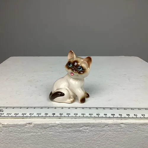 Small black and white ceramic cat ornament