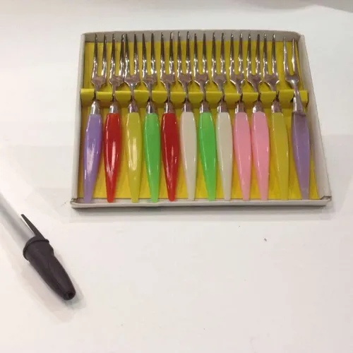 set of 12 cocktail forks with multi coloured handles in original card box
