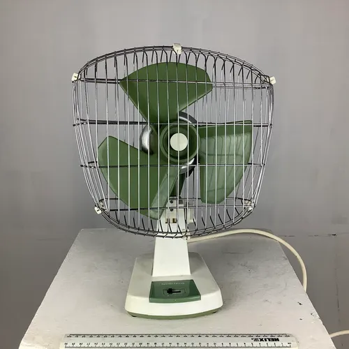 White and green Xpelair-taurus desk fan