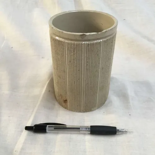 Cream ribbed stoneware jar