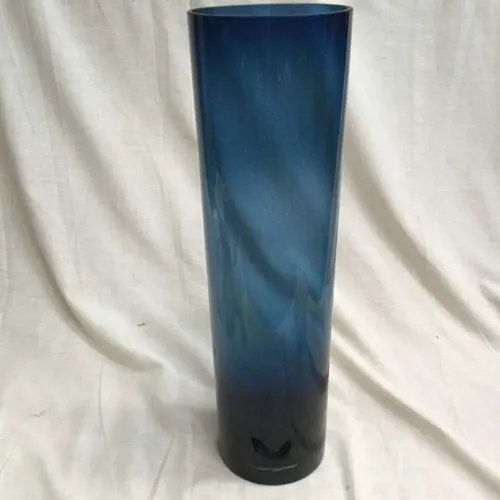 Tall cylindrical blue glass vase