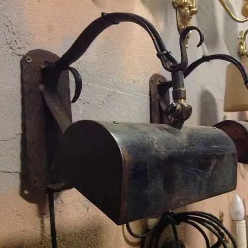 rusty black metal wall light