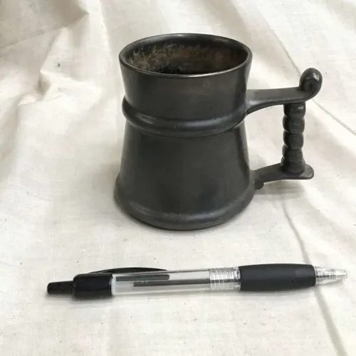 Small pewter tankard with twisted handle