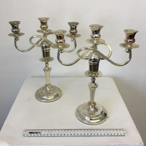 Pair of silver candelabra with two twisted branches