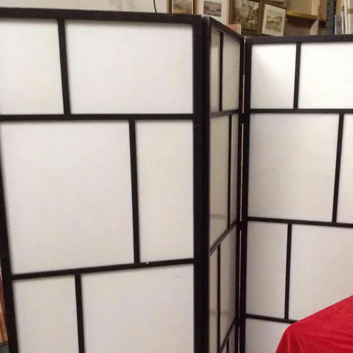 three panel hinged partition screen. Black and white modern design.