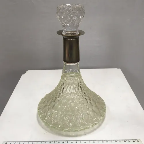 Cut glass decanter, circular base, metal band around neck
