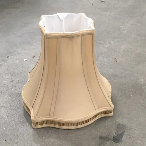 Beige lampshade wide wide detailed base 