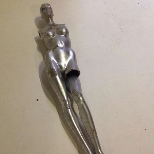 Silver Armless Mannequin With Detached Leg
