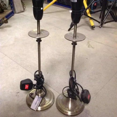 brass coloured metal stick lamp base