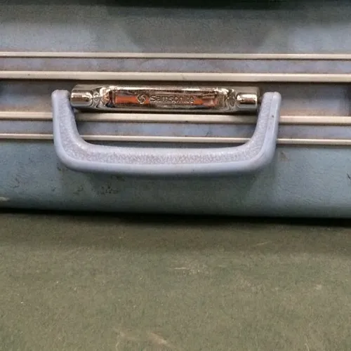 Period light blue Samsonite suitcase