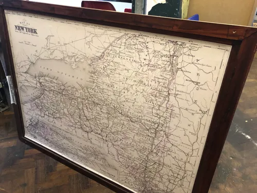 Large wooden frame with map