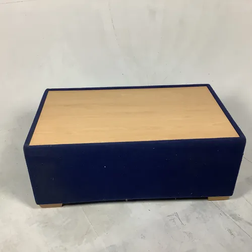 Blue fabric and light wood waiting room / coffee low table