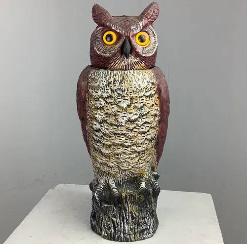 Owl figure with moving head