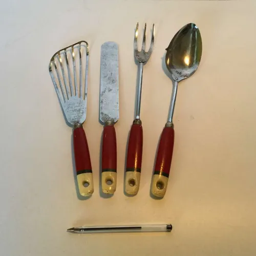 4-part set of period kitchen utensils with red and cream wooden handle