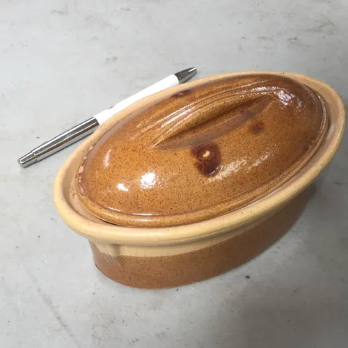Small brown ceramic dish with lid