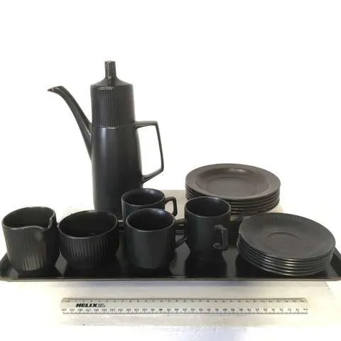 Black vintage coffee set with tray.