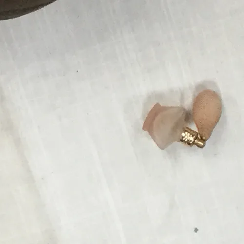 Small pink perfume bottle with pink atomiser 