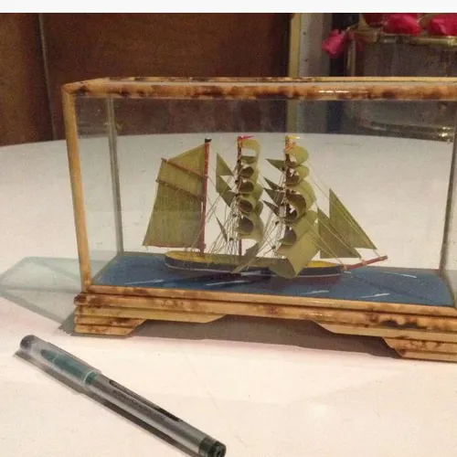 model ship in glass display box
