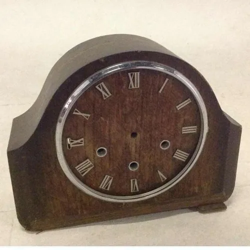 wooden analogue mantle clock with metal numbers and metal rim