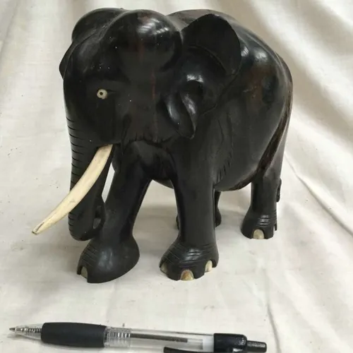 Dark Wood Elephant Ornament with White Tusks