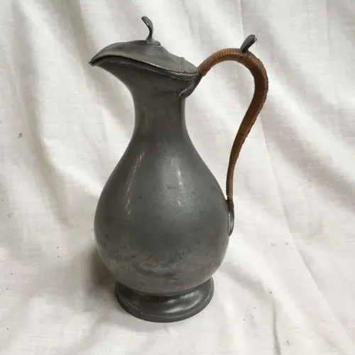 Pewter decanter/pitcher with wicker wrapped handle