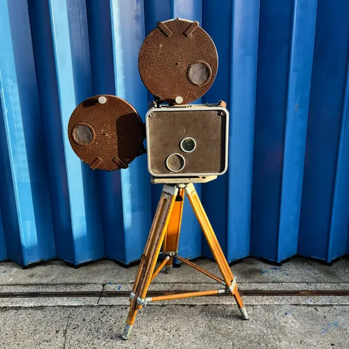 Period TK35 35mm Travelling Cinema Projector on Wood Tripod Stand