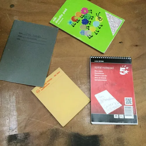 Assortment of thin notepads