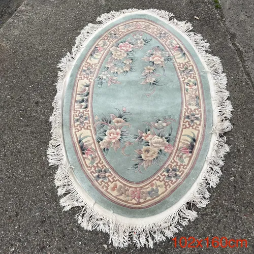 Pale Blue Oval Chinese-Style Rug with White Fringe