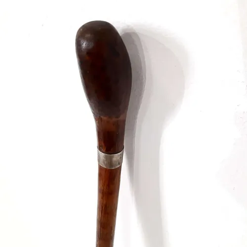 Dark wood walking stick/cane with bulbous handle and silver plaque detail